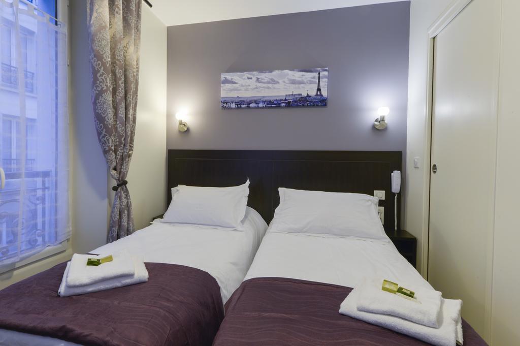Hotel Du Quai De Seine Parijs Kamer foto