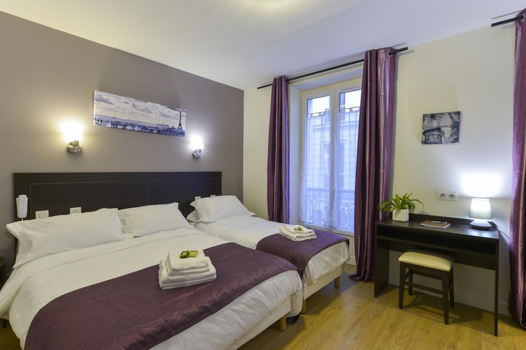 Hotel Du Quai De Seine Parijs Kamer foto
