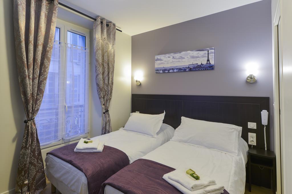 Hotel Du Quai De Seine Parijs Kamer foto
